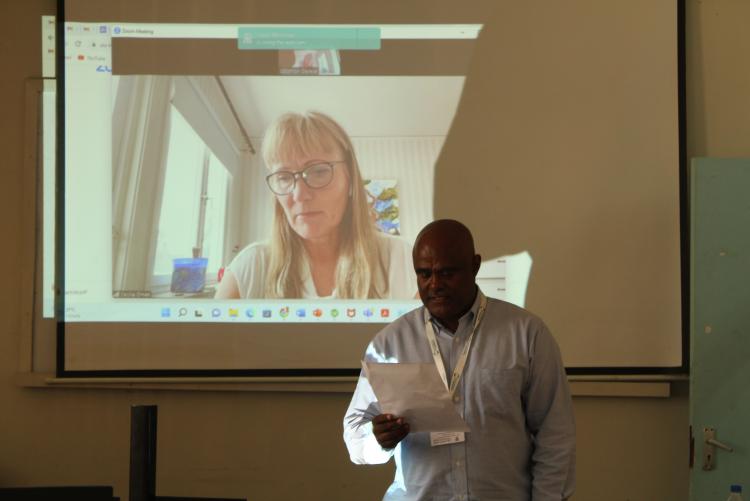 Dr. Derese facilitating the online presentation