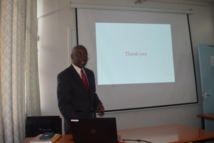 Prof Lugemwa inviting questions after his slides presentation