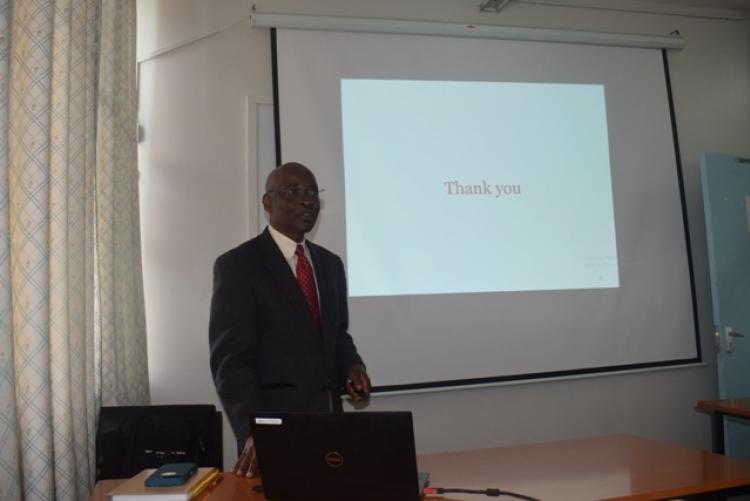 Prof Lugemwa answering questions during his presentation