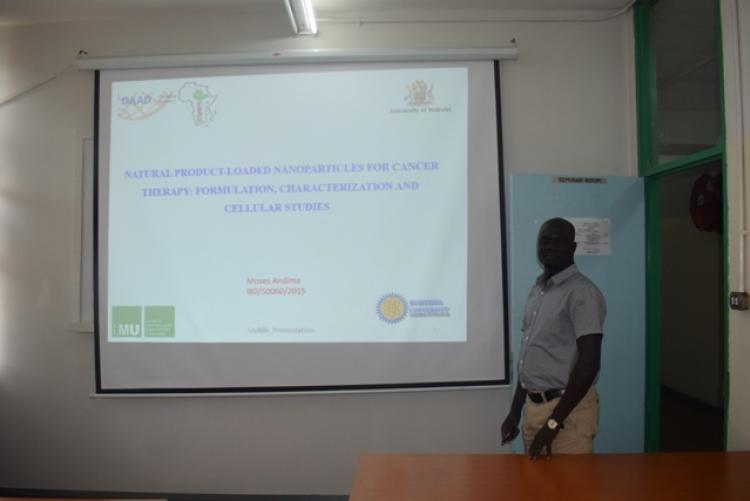 Mr Andima Moses, PhD student presenting his work