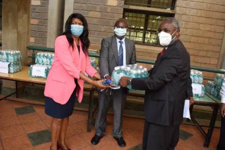 VC & Dean, School of Physical Sciences handing over Chiroklean hand wash liquid soap