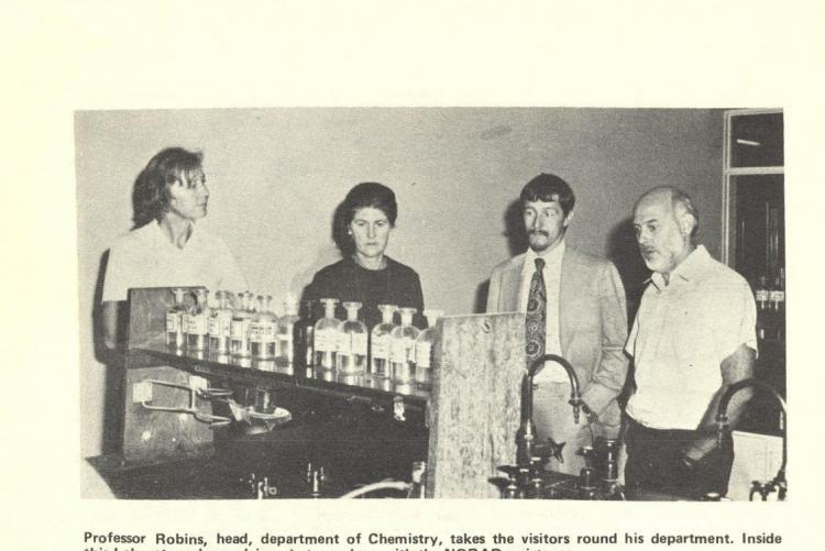 Prof. Robins, former Chairman, Chemistry takes the visitors round the laboratory