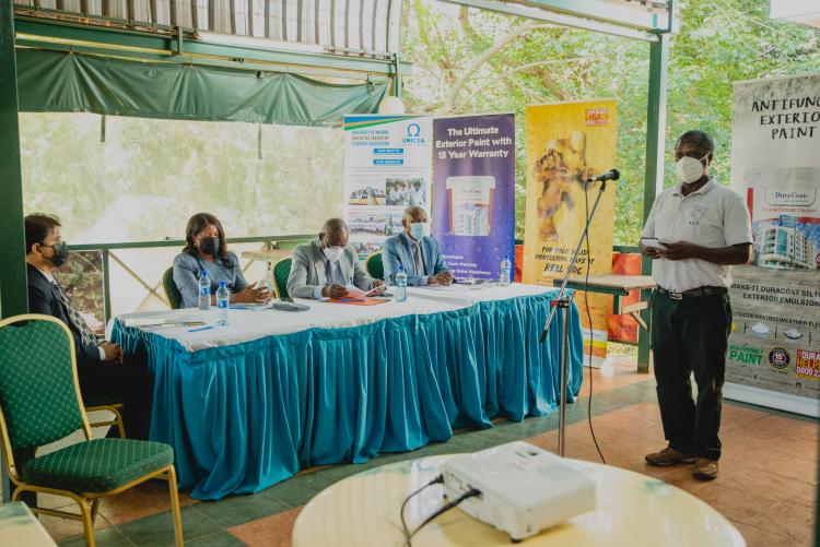 Kenya chemical society representative giving a presentation during the event