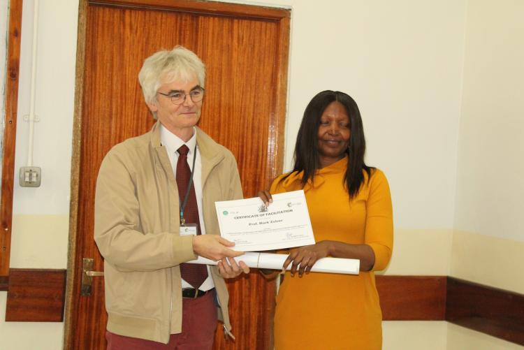 Prof. Mark Zolver receiving his certificate
