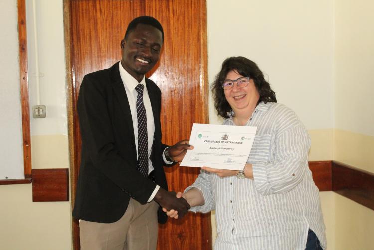 Mr. Andanyi, PhD student receives his certificate of attendance