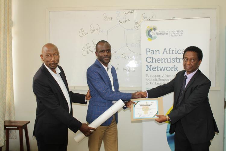 MSc. student being awarded the certificate